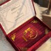 Mehroon booklet with box in textured fabric